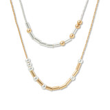 Silver and gold necklace with rods and beads spelling out morse code with the theme of strength.