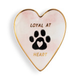 Heart shaped ceramic dish with a gold rim. The interior has a paw print and says "Loyal at Heart".