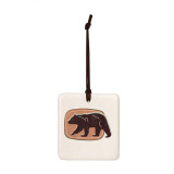 A square hanging tile ornament with a graphic image of a walking black bear on a brown background.