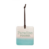 A square tile hanging ornament with a lake scene that says "Paradise Found".