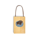 A wood hanging gift card ornament with an illustration of a buffalo on a blue background on the front. The back has a holder for a gift card.