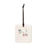 A square cream hanging tile magnet ornament with an illustration of boats in a cove.