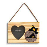 A rectangular wood hanging ornament with a 2x2 inch heart shaped photo opening next to an image of a black bear peeking over a wood stump with Virginia on it.