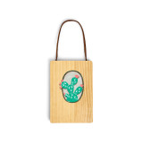 A wood hanging gift card ornament with an illustration of a green cactus on a light gray background on the front. The back has a holder for a gift card.