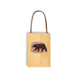 A wood hanging gift card ornament with an illustration of a walking bear on a peach background on the front. The back has a holder for a gift card.