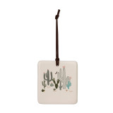A square cream hanging tile magnet ornament with an illustration of different cacti.