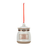 A cream honey pot ornament with the saying "Share a little Kindness" on the front and a lid that opens.