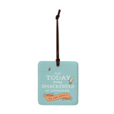 A square light blue hanging tile magnet ornament that says "May Today bring Smackerels of Adventure on the Beach" with an image of Pooh and Piglet.