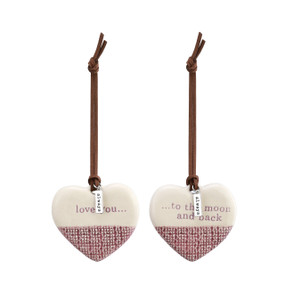 A pair of two textured purple and ivory ornaments that read "love you..." and "... to the moon and back".