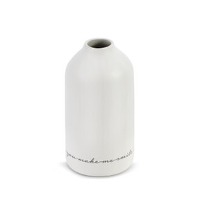 Cream colored small vase with the words You Make Me Smile at the base