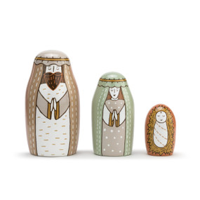 A set of three pastel colored nesting nativity pieces- A Joseph, a Mary, and a Baby Jesus.