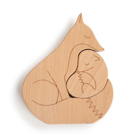 A simple wooden animal puzzle, with two pieces. A fox and its pup nestled together.