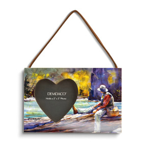 A rectangular wood hanging frame with a heart shaped 2 inch photo opening next to a watercolor image of a fisherman.
