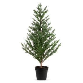 Large fake evergreen tree in a black planter.