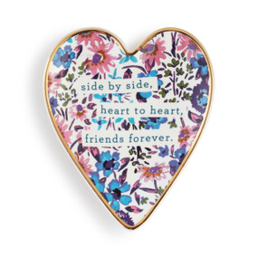 Heart shaped ceramic dish with a gold rim. The interior is bright blue and pink flowers and says "side by side, heart to heart, friends forever".
