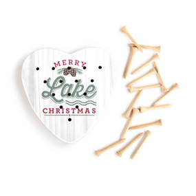White wood heart shaped peg game that says "Merry Lake Christmas". Displayed with the wood pegs out and to the side.