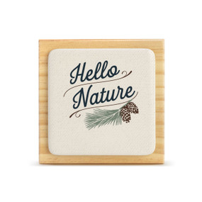A light wood square plaque with a bone tile attached that says "Hello Nature".