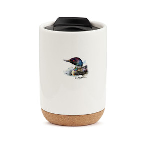 A cork bottom cream ceramic mug with a black travel lid. The tumbler has a Dean Crouser watercolor image of a loon.