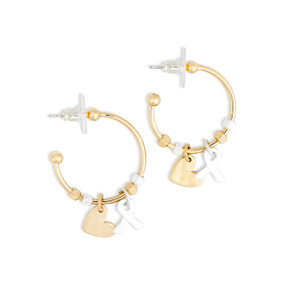 A pair of gold hoop earrings with gold and silver beads and two charms, a gold heart and silver ribbon.