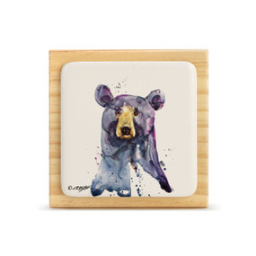 A square wood plaque with a tile attached that has a watercolor image of a black bears face.