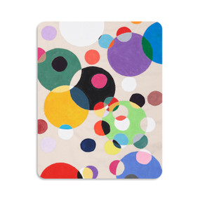 A 120 piece puzzle of circles in different sizes and colors, inspired by artwork created by ArtLifting artist Susan Spangenberg.