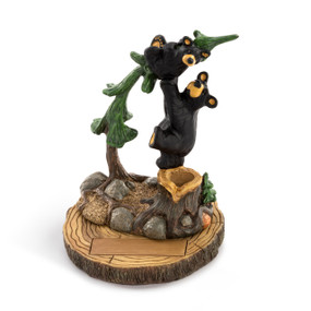 A sculpted figure of a black bear standing on a tree stump catching a small black bear clinging to a leaning tree. The base has a rectangular space for personalization.