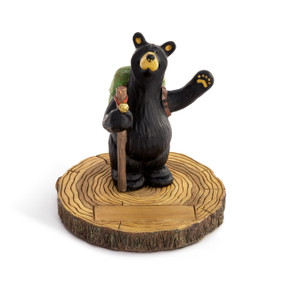 A sculpted figure of a black bear wearing a backpack and carrying a hiking stick. The base has a rectangular space for personalization.