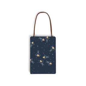 A painted dark blue wood hanging gift card ornament with an illustration of fireflies and stars. The back has a holder for a gift card.