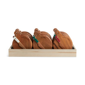 A table top wood tray displayer with an assortment of round wood serving boards with wood spreaders attached.