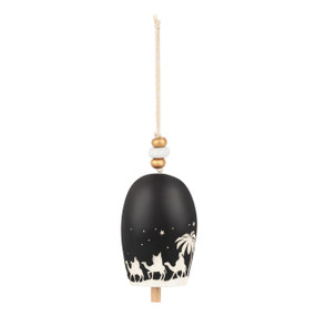 A black decorative bell with the nativity scene in white and beads at the top.