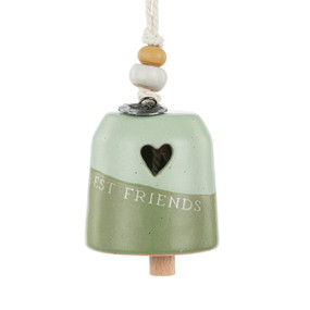 A mini light and dark green bell with a cut out heart and says "Best Friends". There are beads and a metal token at the top of the bell.