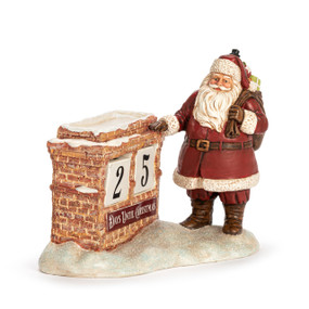 A figure of Santa holding his sack of toys next to a chimney countdown calendar that says "Days Until Christmas".