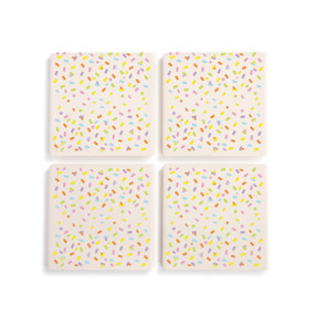 A set of four square ceramic coasters with a bright colorful confetti pattern.