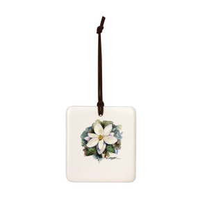 A square cream hanging tile magnet ornament with a watercolor image of a white magnolia.