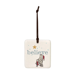 A square cream hanging tile magnet ornament that says "Believe", with an image of Pooh and Piglet staring up at a star.