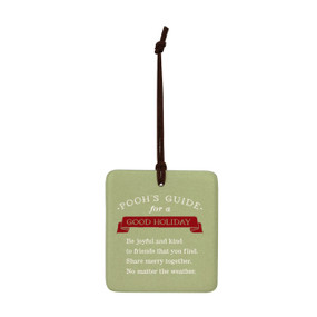 A square light green hanging tile magnet ornament that says "Pooh's Guide for a Good Holiday".