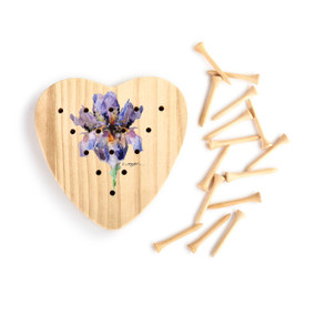 A wood heart shaped peg game with a watercolor image of a purple iris, displayed with the wood pegs out and to the side.