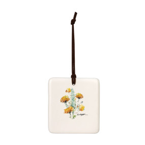 A square cream hanging tile magnet ornament with a watercolor image of a sagebrush.