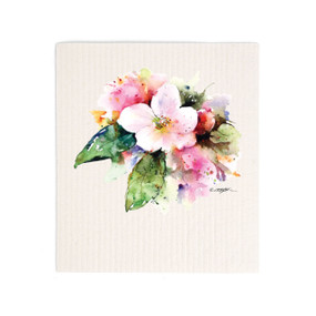 A white biodegradable dish cloth with a watercolor image of an apple blossom.