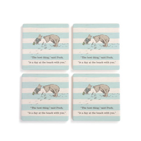 A light blue and white striped set of four square ceramic coasters that say "The best thing," said Pooh, "is a day at the beach with you." with Pooh and Piglet building sandcastles.