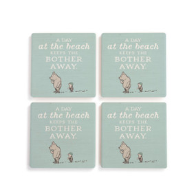 A set of four light green square ceramic coasters that say "A Day at the beach Keeps The Bother Away" with an image of Pooh and Piglet.