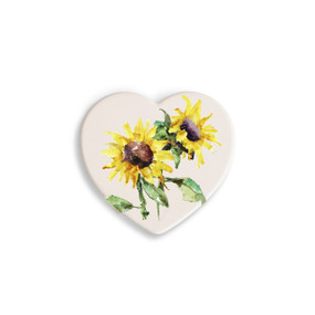 A set of four heart shaped white ceramic coasters with a watercolor image of yellow sunflowers.