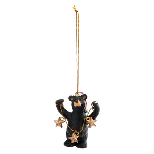 Hanging ornament of a black bear holding a string of gold stars