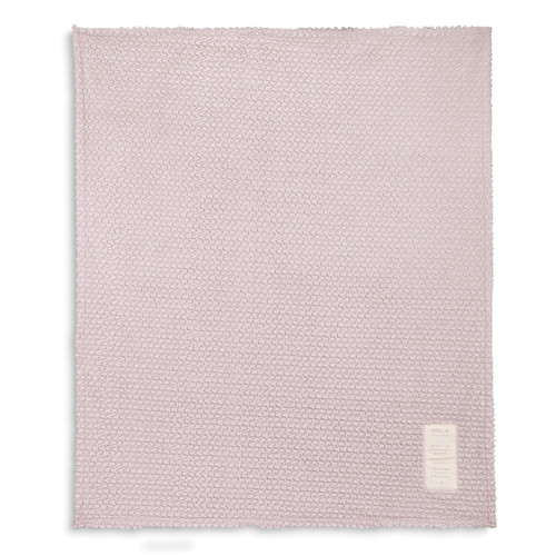 Light pink towel laid out