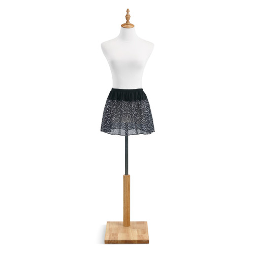 Black and white polka dot shirt extender on mannequin