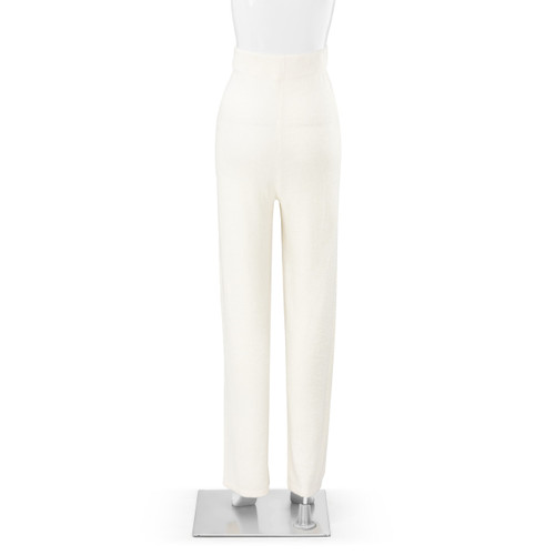 The backside of a size L/XL pair of soft cream sweatpants with a tie front placed on a white and silver mannequin.