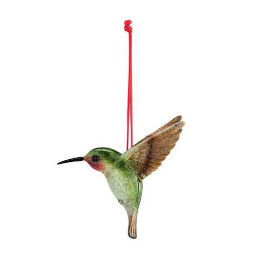 A glass ornament of a green and brown hummingbird, with a red string.