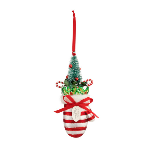 A red and white striped blown glass ornament of a winter mitten. Filled with a red and green Christmas tree, and candy canes.