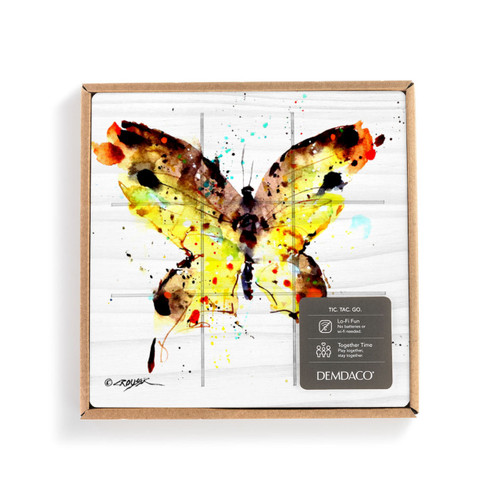 A square wood tic tac toe board with a watercolor image of a yellow butterfly, displayed in a packaging box with a product information tag.