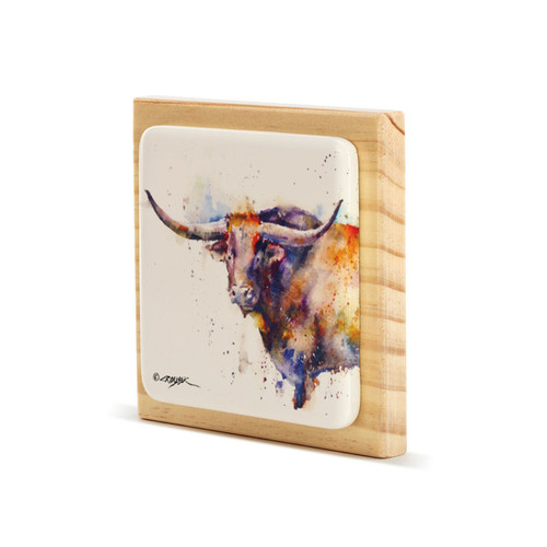 A square wood plaque angled to the left with a tile attached that has a watercolor image of a longhorn.